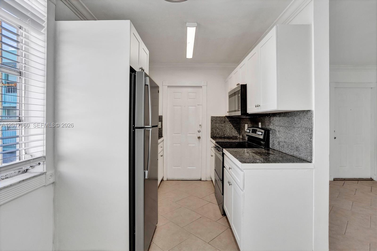 713 COLLINS CONDO - Residential Lease