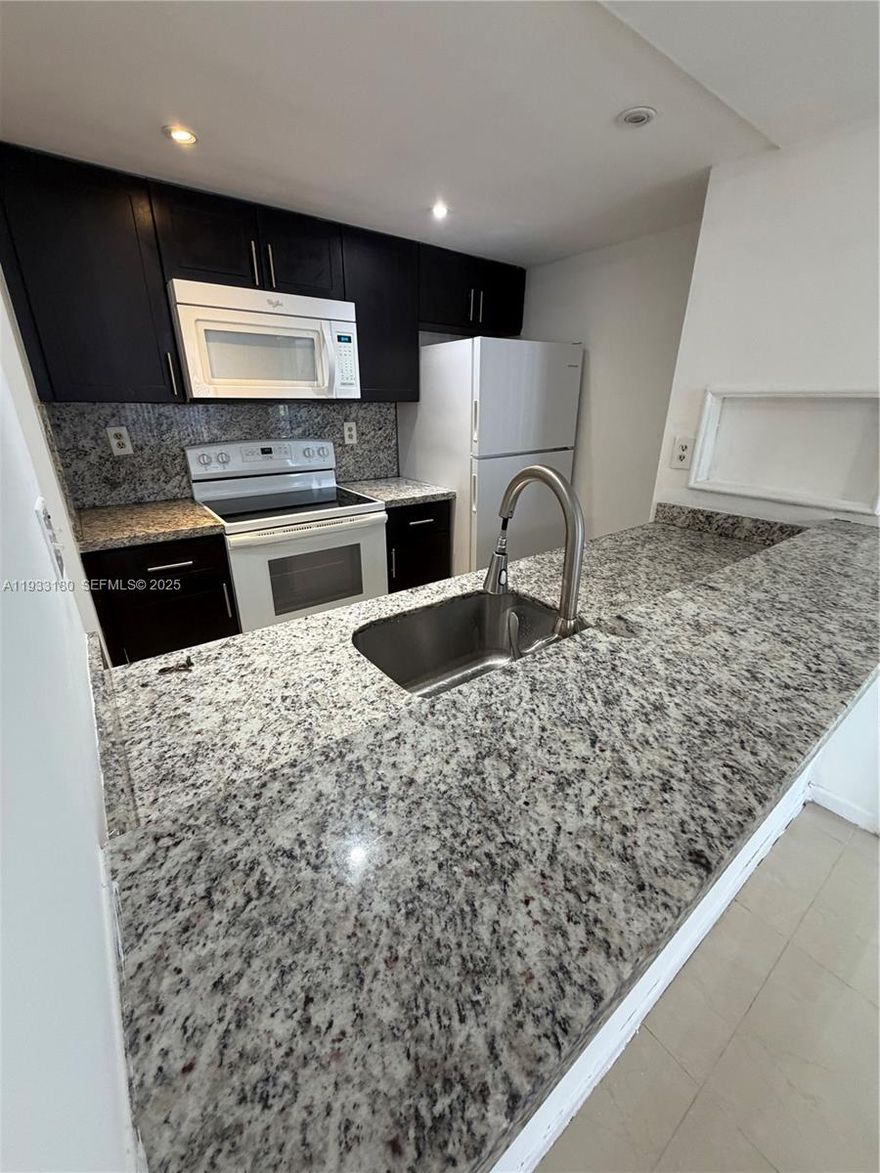 Beautifully remodeled two-bedroom, two-bathroom unit offering an excellent investment opportunity. Currently leased!!! This property provides immediate and reliable cash flow for investors. The modern open-concept layout is filled with natural light and features a stylish kitchen with updated appliances and sleek finishes. Both bedrooms are spacious and comfortable, complemented by well-appointed bathrooms that enhance the overall appeal. Situated in a vibrant community with easy access to shopping, dining, and entertainment, this unit combines strong investment potential with a highly desirable location. A fantastic opportunity not to be missed.