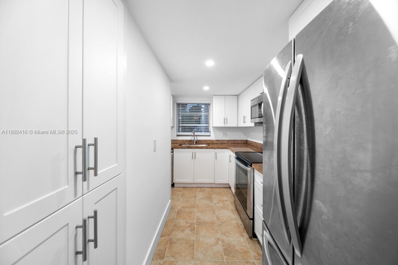 VILLAGE AT DADELAND CONDO - Residential