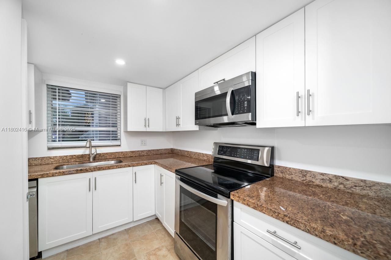 VILLAGE AT DADELAND CONDO - Residential