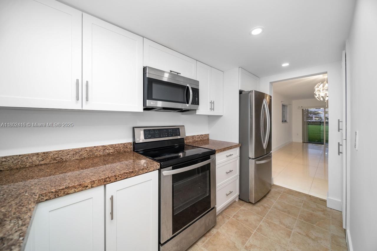 VILLAGE AT DADELAND CONDO - Residential