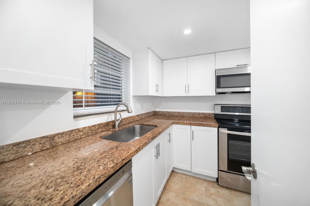 VILLAGE AT DADELAND CONDO - Residential