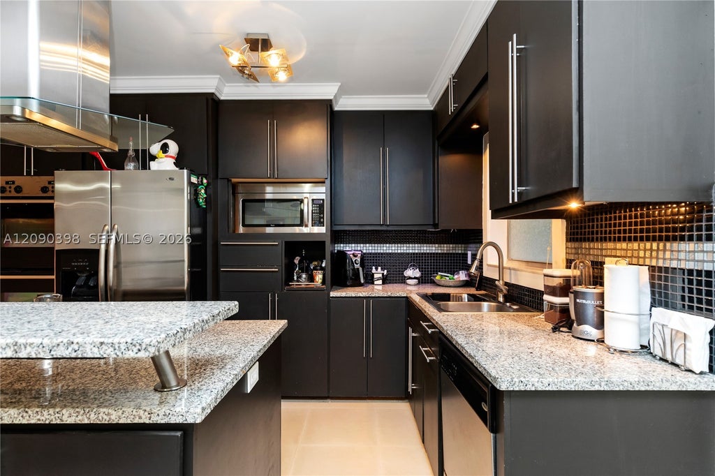 Photo of 8400 W Sample Rd #206, Coral Springs, FL 33065 (MLS # A12090398)