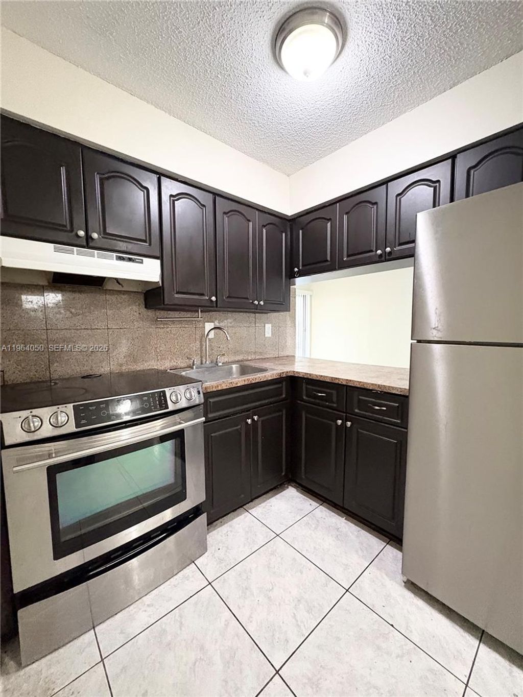 Photo of 813 SW 10th St #B, Hallandale Beach, FL 33009 (MLS # A11964050)