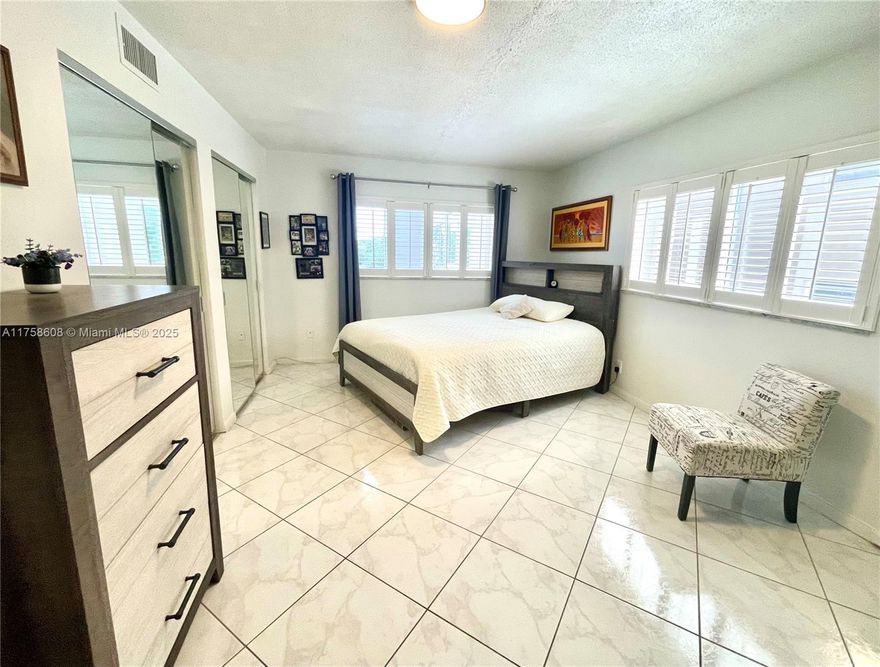 Updated 1BR/1.5BA Condo – 55+ Community! Move-in ready furnished & turnkey condo with impact windows and door, offering a garden view & sea breeze. Condo located in the fantastic Village Royale, enjoy 2 clubhouses, pools, spa, and numerous amenities. Residents can enjoy clubhouses for events, a card room, library, billiards, shuffleboard, BBQ area, walking paths & more. HOA includes water, cable, internet, building insurance, security, property management, elevator, parking, pest control & more. Prime location near shopping, major roads, golf courses, and beautiful beaches. No minimum down payment required—fully funded condo association!