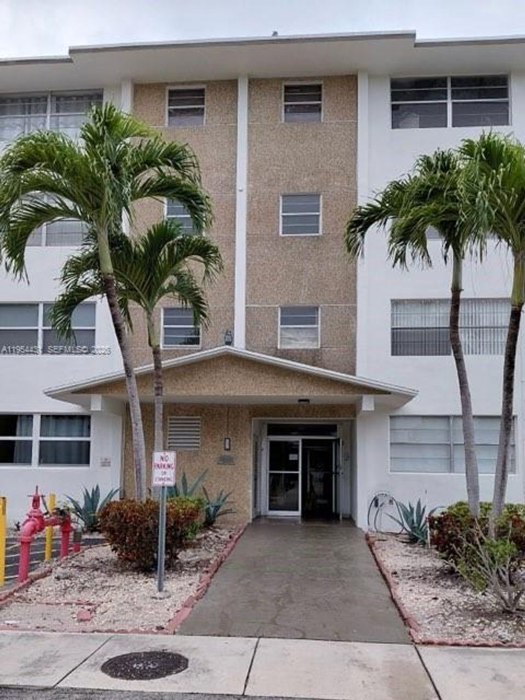 Photo of 211 NE 8th Ave #108, Hallandale Beach, FL 33009 (MLS # A11954431)