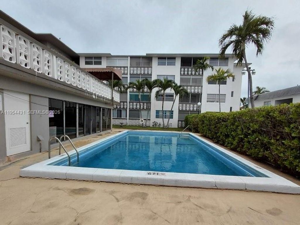 Photo of 211 NE 8th Ave #108, Hallandale Beach, FL 33009 (MLS # A11954431)