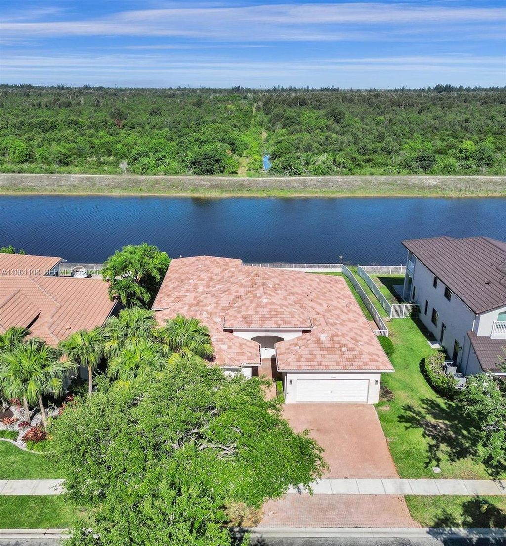 Photo of 3360 SW 195th Ter, Miramar, FL 33029 (MLS # A11961108)
