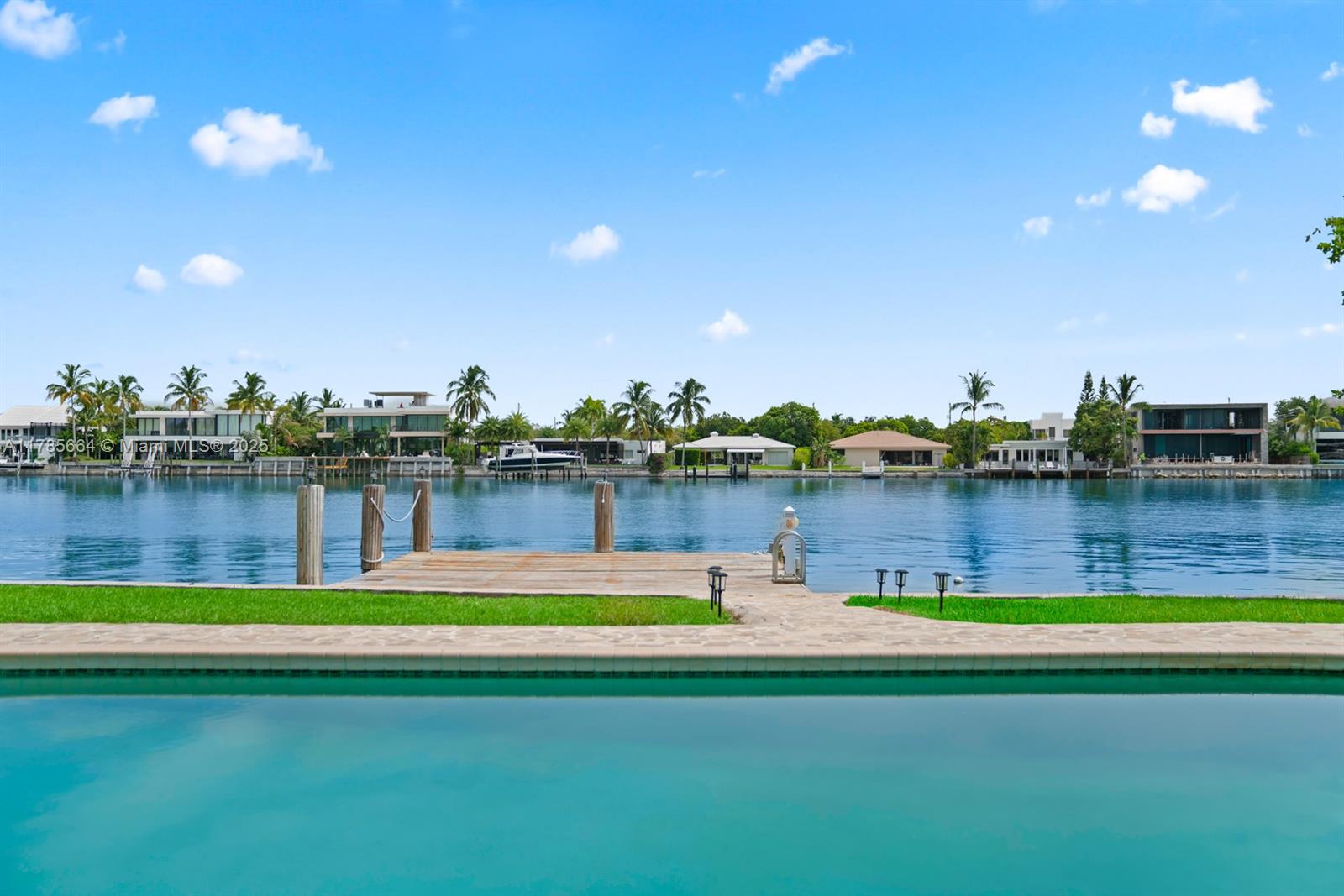 Discover the best-priced waterfront home in the prestigious gated community of Normandy Shores. This charming 3-bedroom, 2-bathroom residence boasts 78 feet of direct water frontage with unrestricted ocean access, ideal for docking boats up to 60 feet.
Enjoy breathtaking water views from your backyard and indulge in the exclusive lifestyle offered by Normandy Shores, featuring a championship golf course, tennis courts, and a beautifully maintained residents’ park.
Perfectly located just minutes from Miami’s pristine beaches, world-class dining, and top-rated schools.
This property is available for short-term and long-term rental.