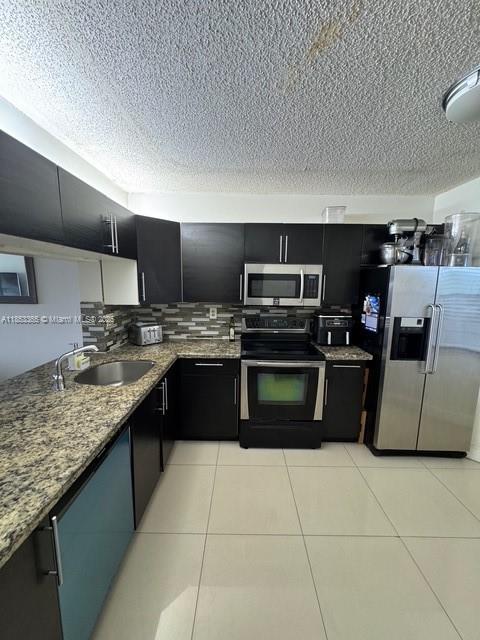Upgraded Condo on 5th floor with great views at township Coconut Creek. Upgraded / large eat-in kitchen with
granite countertops and stainless steel appliances. Tile in living room / kitchen. Laminate floors in bedrooms,
washer / dryer in unit. Community pool next to building and access to township recreational area.