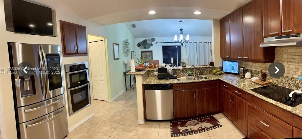 Photo of 2550 SW Cooper Ln, Port Saint Lucie, FL 34984 (MLS # A11366036)