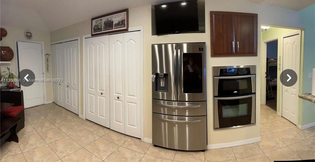 Photo of 2550 SW Cooper Ln, Port Saint Lucie, FL 34984 (MLS # A11366036)