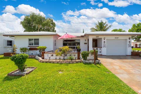 Photo of 5809 NW 83rd Ave, Tamarac, FL 33321 (MLS # A12016744)