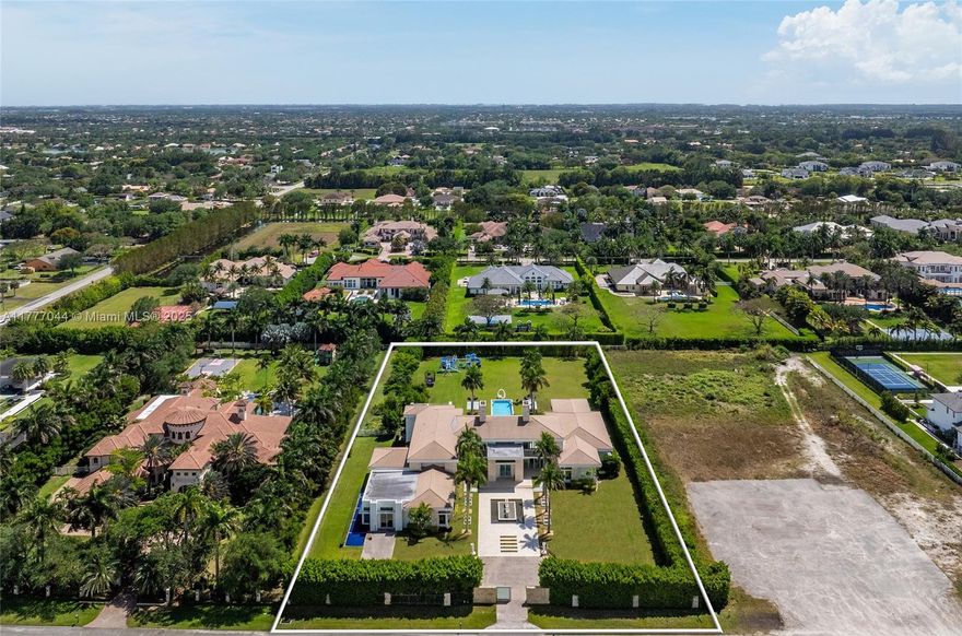 Stunning 2.4 acre contemporary estate located in prestigious gated Landmark Ranch Estates. Built in 2017, this grand 6-bed/6-bath +2 home features 13,000+ SF of spacious living over two floors with 15,000+ SF in total, with a floor plan designed for entertaining and big gatherings. With i 24-foot ceilings and floor to ceiling glass, the home allows for spectacular views of the impressive acre-sized backyard and resort sized pool. Landmark Ranch Estates is a multi-acre private luxury gated residential community in SW Ranches. Located 20 minutes from Fort Lauderdale Airport and the beaches, don’t miss this opportunity.