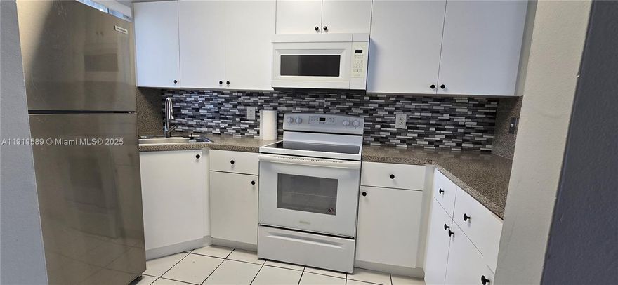 Beautiful and remodeled 2 bedroom / 1 and half bath.  Corner Unit.   Two story condo.  Bedrooms on second floor.   Property features, two walk-in closets.  Two private balconies, storage closet,  led lighting throughout and freshly painted.  One assigned parking space with plenty of visitor parking.   No rental restrictions.  Ideal for investors and first time buyers.  Seller will pay for the  special assessment.  Easy to show