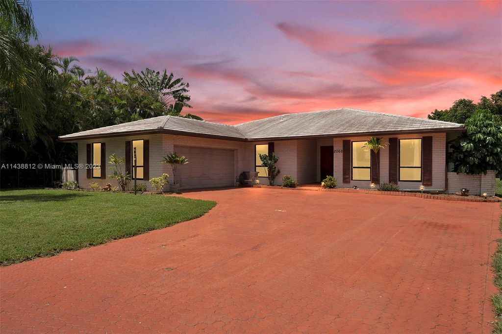 Photo of 2068 NW 100th Way, Coral Springs, FL 33071 (MLS # A11438812)