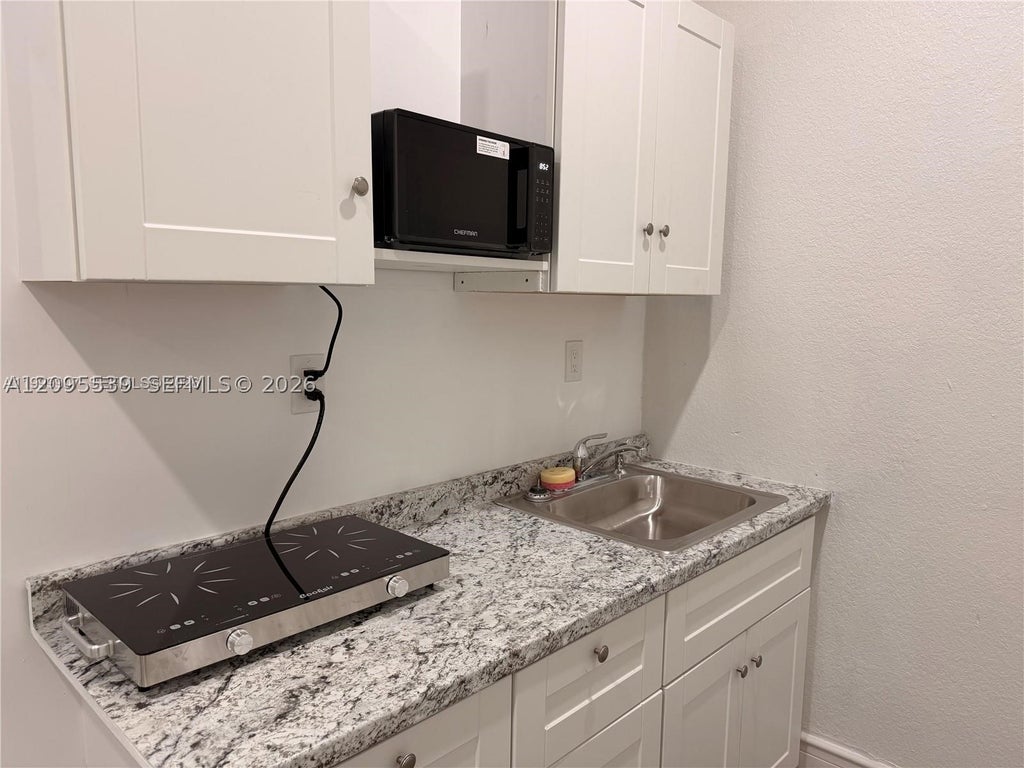 Photo of 2804 NW 7th Ct #2804, Fort Lauderdale, FL 33311 (MLS # A12095539)