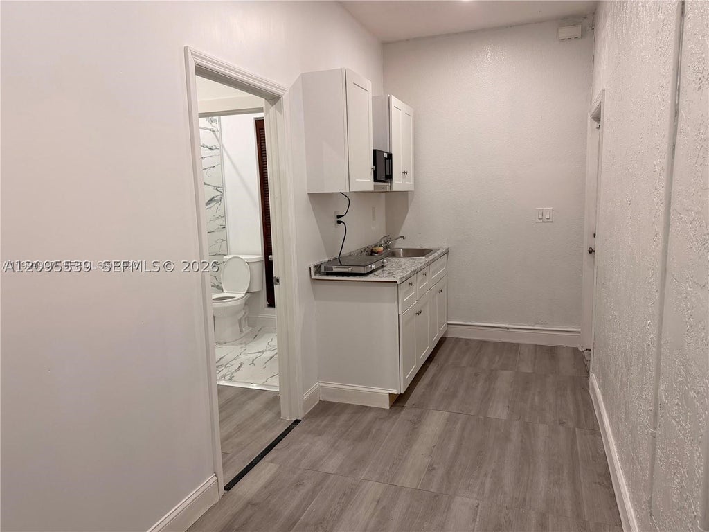 Photo of 2804 NW 7th Ct #2804, Fort Lauderdale, FL 33311 (MLS # A12095539)