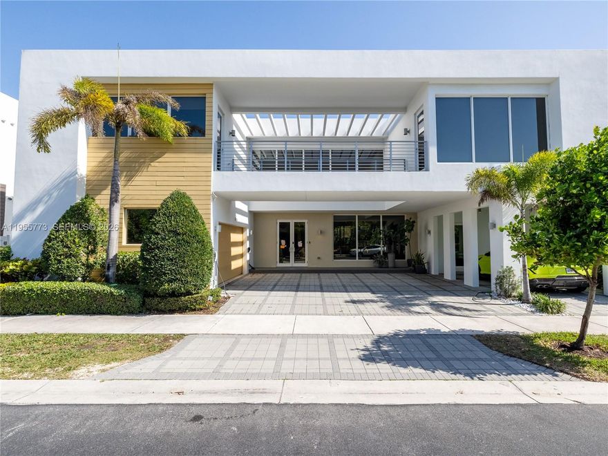 Exquisite luxury rental in the exclusive Modern 75 community in Doral. This impeccably renovated residence offers 6 elegant bedrooms and 7 spa-inspired bathrooms, showcasing high-end finishes and a sophisticated contemporary design. Enjoy a private resort-style pool and stunning panoramic lake views, perfect for refined indoor-outdoor living. A rare opportunity to lease a turnkey masterpiece in a prime location. 2 Car garage + 4 additional parking spaces