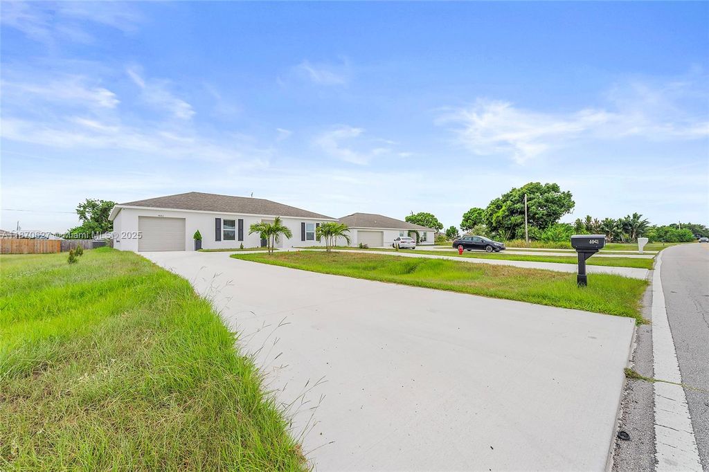 Photo of 4061 SW Port St Lucie Blvd, Port St Lucie, FL 34953 (MLS # A11870627)