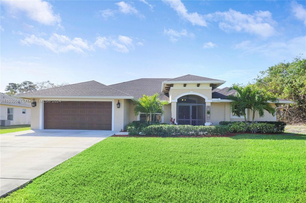 Photo of 6022 NW Wolverine Rd, Port Saint Lucie, FL 34986 (MLS # A11530587)