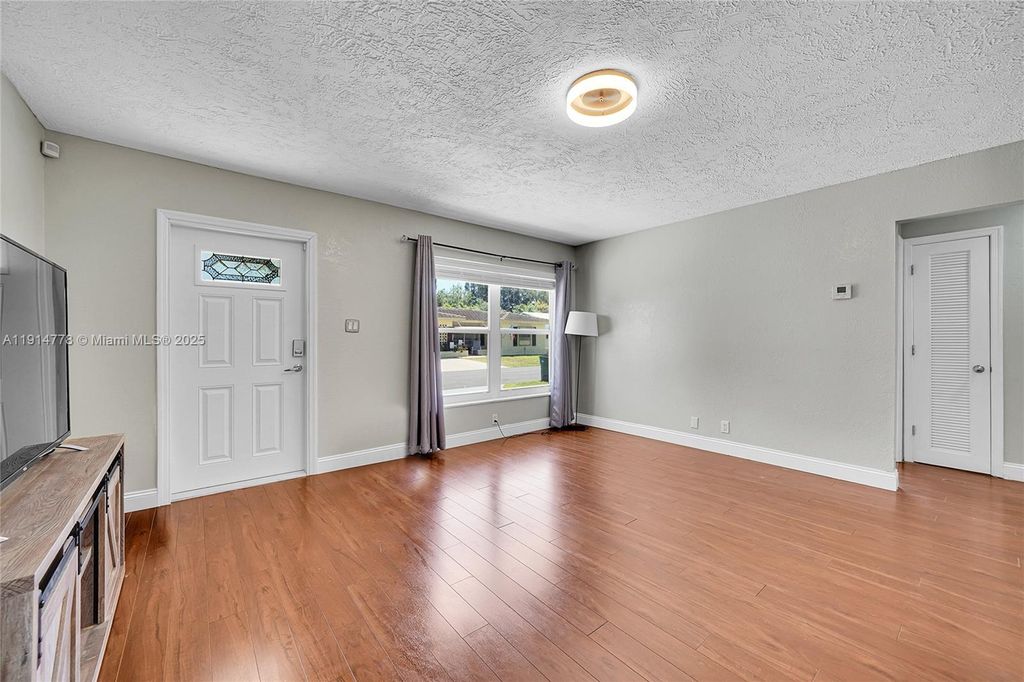 Photo of 6001 NW 66th Ter, Tamarac, FL 33321 (MLS # A11914778)