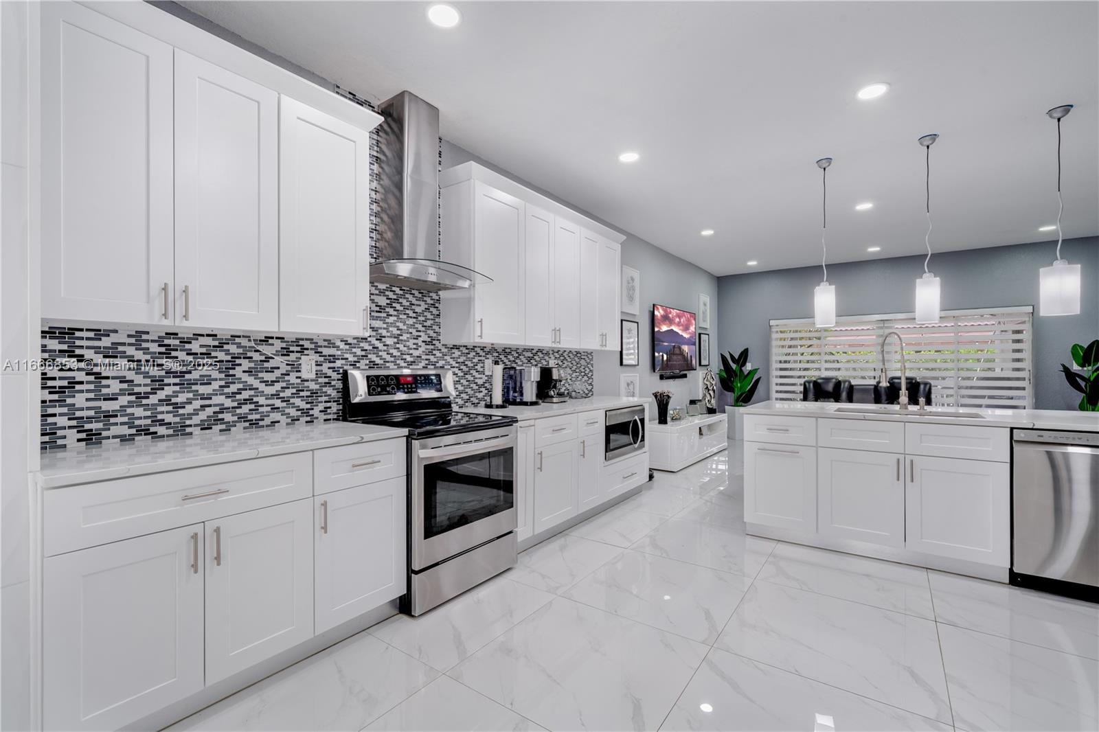 Nestled in the heart of Miami Lakes is your Dream Home !! Seller spared no expense creating this fabulous open floorpan. Quartz countertops with Wood cabinets highlight this modern kitchen equipped with SS appliances. A newer A/C ensures you're cool & comfortable from the Florida heat. Zebra blinds & blackout curtains provide ample shade when needed . The renovated bathrooms will indulge you with a spa like ambiance which will help you unwind after a hard day's work. As you continue on to the outdoor space you will be welcomed by a cozy zen like patio ready for entertaining or can also provide a retreat from the hustle & bustle of city life. CCTV cameras, tankless water heater. Your new home awaits !
*Up to $5000.00 Lender Credit towards closing when using seller's preferred lender*