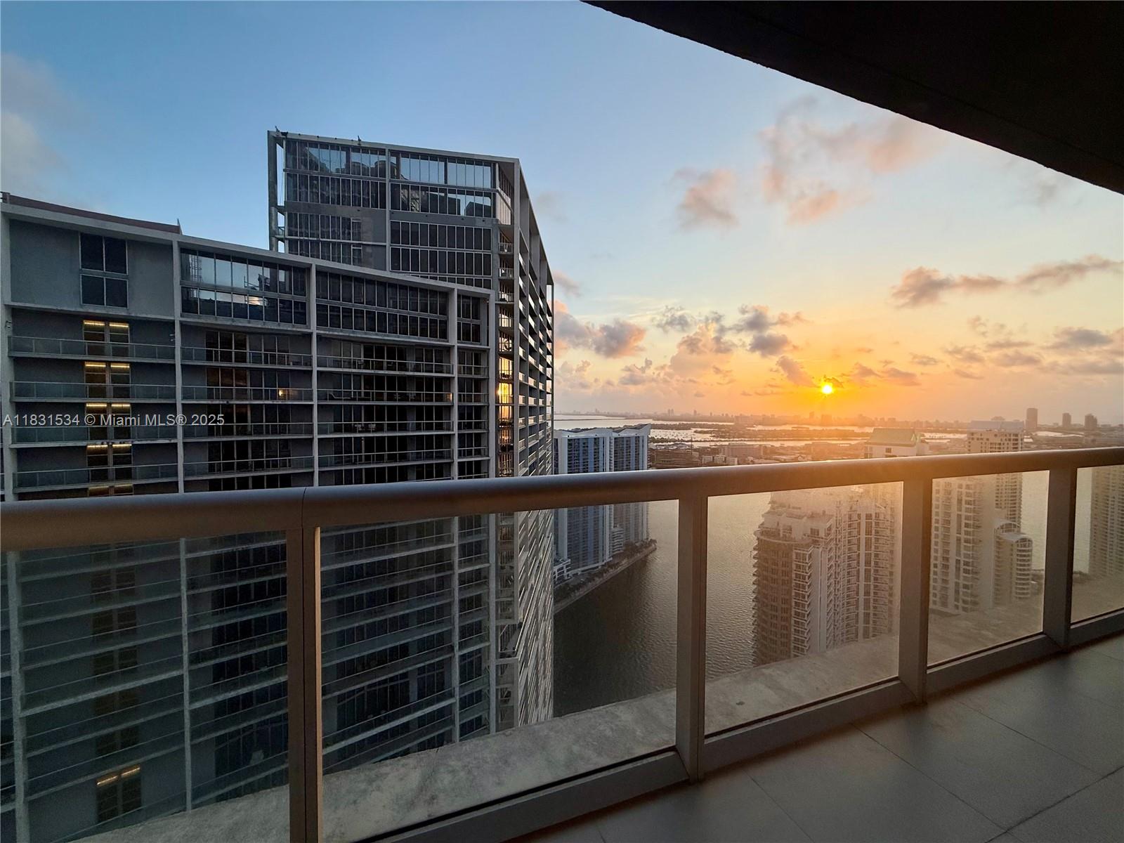 Perched on the 51st floor, this fully renovated residence offers sunrise and waterfront views high above Brickell. Every detail was intentionally curated—from Sub-Zero/Wolf appliances and custom cabinetry to the invisible cooktop—creating a minimalist sanctuary that blends warmth with sophistication. Large-format porcelain floors, integrated smart home system, and a clean neutral palette elevate the space. World-class amenities include a spa, fitness center, 1-acre pool deck, and more—within one of Brickell’s most iconic addresses by Philippe Starck. Furnished option available. Ask about low down payment and rate buy-down. Stucco work begins end of Sept—no assessment. Video tour available. Booties required; no kids/pets permitted for showings due to animals on premises. Owner/Broker.
