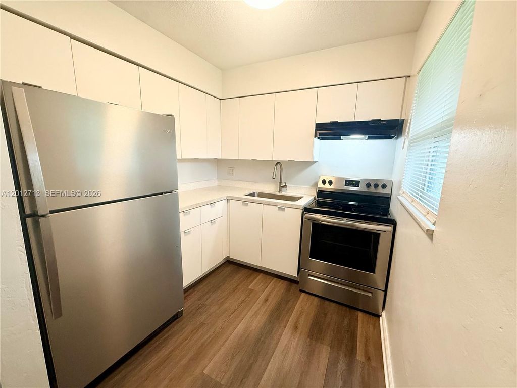 Photo of 220 NE 41st St #2, Oakland Park, FL 33334 (MLS # A12012713)