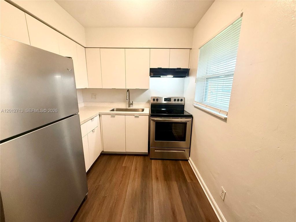 Photo of 220 NE 41st St #2, Oakland Park, FL 33334 (MLS # A12012713)