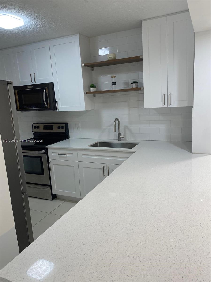 GREENGLADES CONDO I - Residential Lease