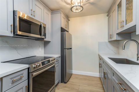 Photo of 1301 SW 134th Way #407B, Pembroke Pines, FL 33027 (MLS # A11460442)