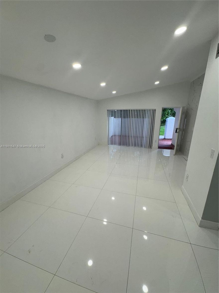 Renovated kitchen and bathrooms!, new closet doors, freshly painted in the heart of Kendall.  First floor 3 bedroom, 2 bathroom apartment ready to move in! Spacious fells like a house. 2 Patios at the entrance and also another in the kitchen. Washer and dryer. Call Consuelo. Easy to show.