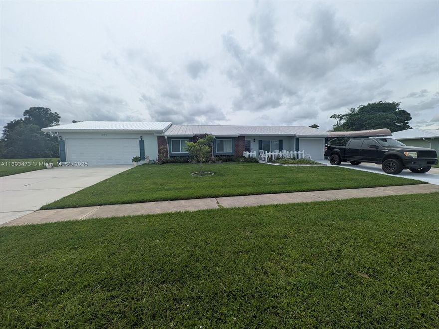 *SELLER OFFERING <3% BACK FOR CLOSING COSTS!* Updated & EXPANDED! Main House w/ MASSIVE ADDITION (2023)! Large OVERSIZED Lot .35 Acres! New Metal Roof! Impact Low-E Windows Throughout! R38+ Insulation - Energy Efficient! 2758 SF of Living Space! 4 Bedrooms (Plus Flex Room)! 3 Master Bedrooms w/ Walk-in Closets! 4 Bathrooms! 3 Car Garage! City WATER & SEWER! Updated Kitchen w/ Granite and Island! New(er) Appliances! HUGE Pantry! Abundant Storage! 2 Energy Efficient Air Conditioners! 2 Water Heaters! Large Screened Patio w/ Vinyl Windows! HUGE Additional Paver Patio w/ Gazebo! Boat / RV / Recreational Vehicle Storage and Access Gate! Vinyl Plank and Laminate Flooring! Split Bedrooms! Window Treatments/Blinds! Alarm & Camera System! Hot Tub! Gutters! 2 Large Sheds! NO HOA/CDD/Community Fees!