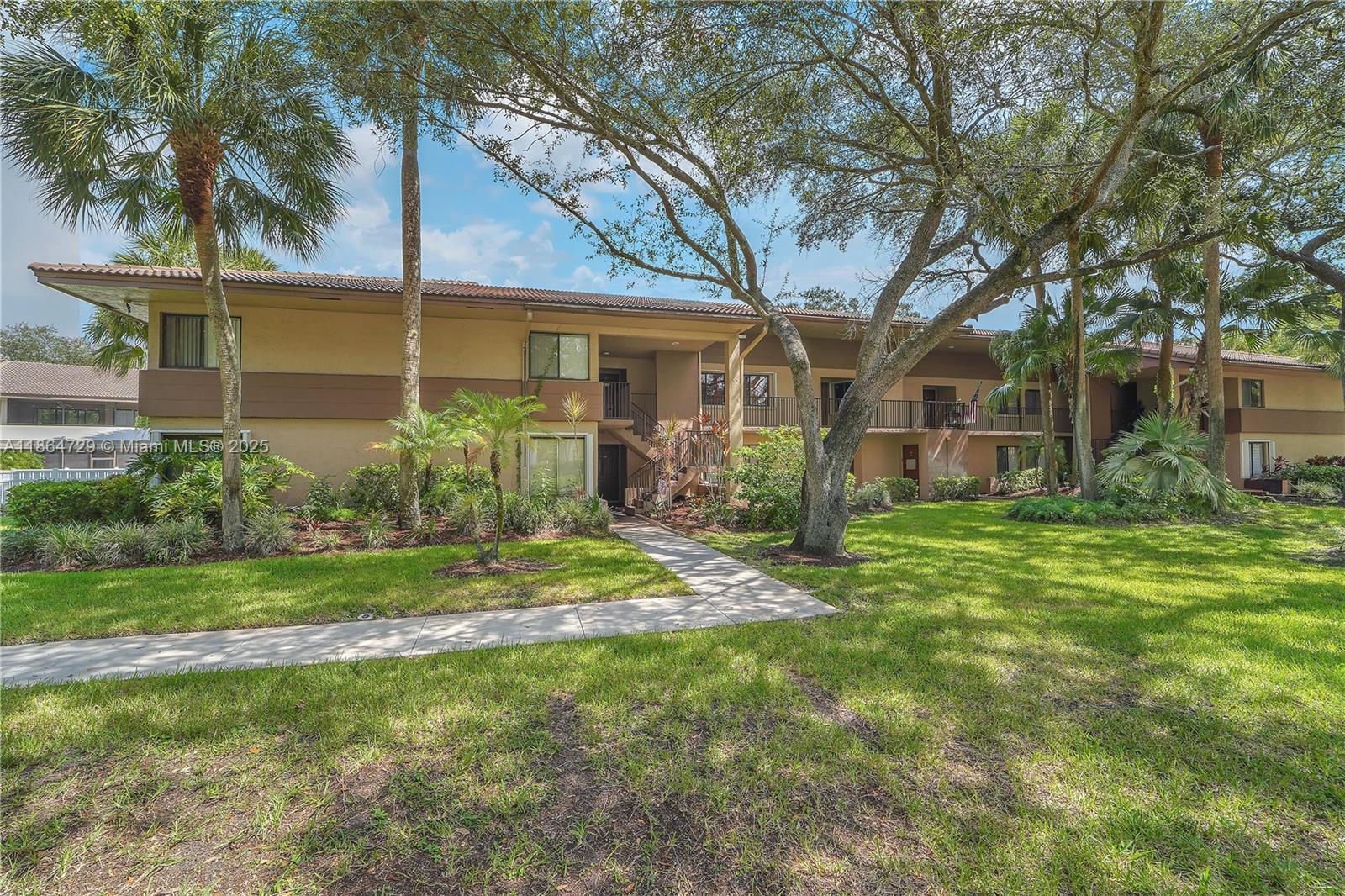 Come see this beautiful and cozy 2-bedroom, 2-bath condo with updated features, ideally located in the heart of Coral Springs! Nestled in a tranquil community near top shopping, dining, and the Coral Springs Mall! Enjoy peace of mind with accordion shutters throughout, and relax on the spacious, private balcony that extends from the living room to the primary bedroom—offering serene views of nature throughout the apartment and a storage closet! Enjoy the relaxing community pool and one of the best parking spots for the building- spot #2. Don’t miss the chance to make this peaceful retreat your new home!