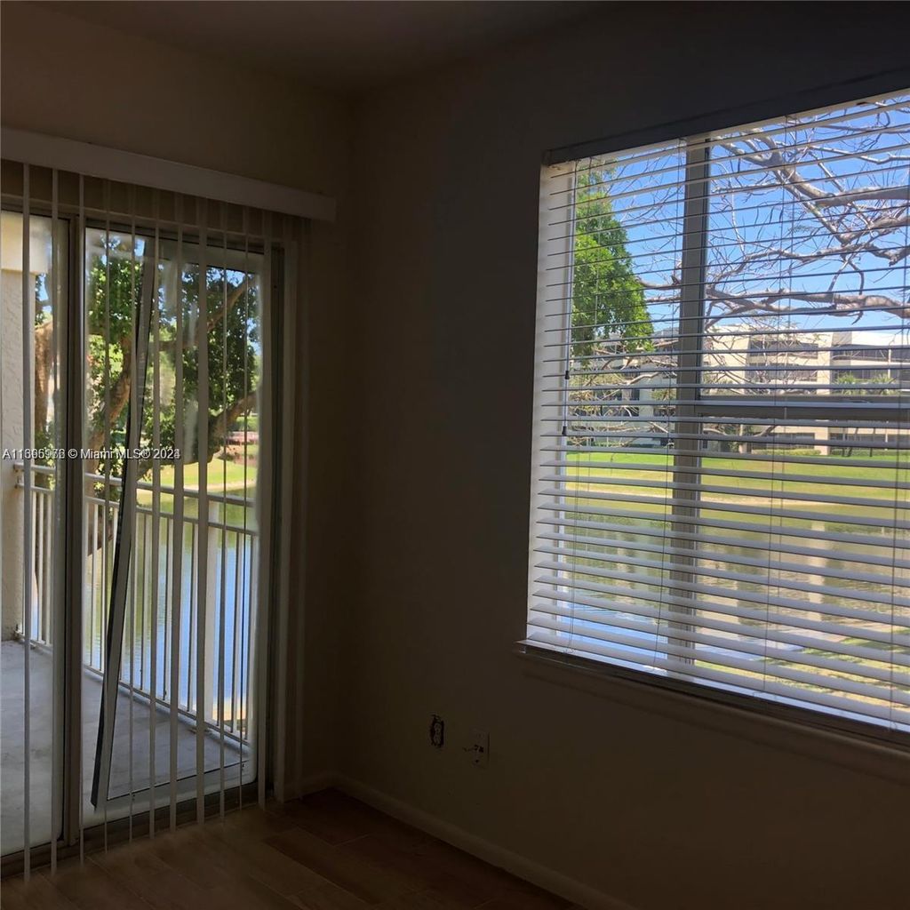 Photo of 1845 Palm Cove Blvd #8-206, Delray Beach, FL 33445 (MLS # A11695976)