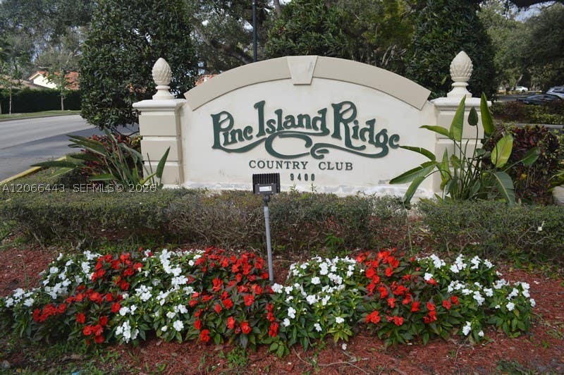 Photo of 9420 Poinciana Pl #407, Davie, FL 33324 (MLS # A12066443)