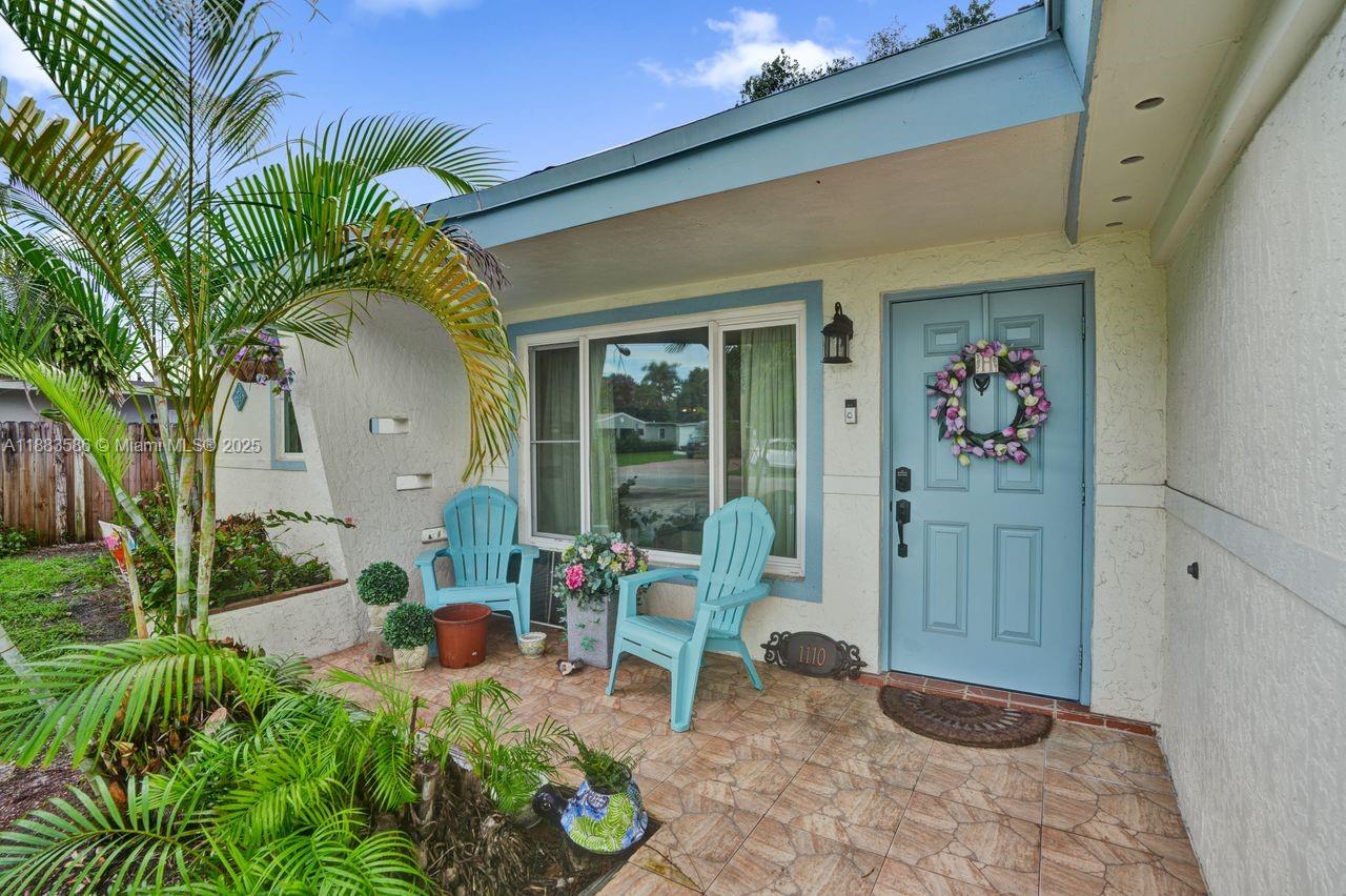 WOW! This home is Beautiful!!! Completely remodeled, entertainer’s kitchen, all drawers & cabinet doors are soft close, corner cabinet has a two level Lazy Susan, pantry has pull out shelves, Refrigerator with icemaker, LG Stove is convection oven & air fryer, new appliances, new washer/dryer, new doors, trims, flooring. AC 2 years old, freshly painted. 2018 Tile roof. Tankless water heater, sprinkler system, alarm system, fireplace. 5 ceiling fans. Great layout, open floorplan, living room, dining room, kitchen, Florida room are all open. Great for parties and family gatherings. Front and back porch. Circular drive fits 4 cars comfortably. Private back yard, quiet neighbors, minutes to highways, Fort Lauderdale airport, Port Everglades and Hard Rock Casino. Completely move-in ready!