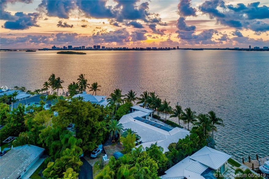 Amazing Water Front One Story Home with Unobstructed Wide Bay Panorama Views of Indian Creek Island and the Beautiful Miami Downtown Skyline. House has been fully remodeled. It features: 4 Bed/6 Baths, New Modern custom kitchen with Bosch appliances (2018) & wet bar. Roof-2014. Impact windows/doors, telescoping doors going out to pool. Salt system infinity pool 35’x15’ + lower pool 30’x7’, Jandi pool equipment. Master suite with very large custom made walk-in closet & spa-like bathroom. All bedrooms have full baths. Two A/C Units. Nutron light system. Generator (Guardian 48KW – Natural Gas). 170 ft of water-frontage on 15,269 SF Lot in Miami Shores. Private Dock with 40’ fingerpier dock with 20K lb boatlift plus 21’ fingerpier dock with 7K lb boatlift, can accommodate up to 100’ ft boat