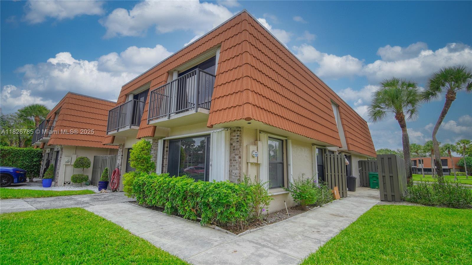 Welcome to this charming townhome located in The Village at Harmony Lake. This conner unit offers a relaxing setting with lake views. This property offers 2,457 square feet for a family to feel comfortable in. Great amenities and community pool to enjoy the Florida sun year long. This property is located in close proximity to the interstate, schools, beaches, grocery stores, shopping plazas, malls, and everything south Florida has to offer.