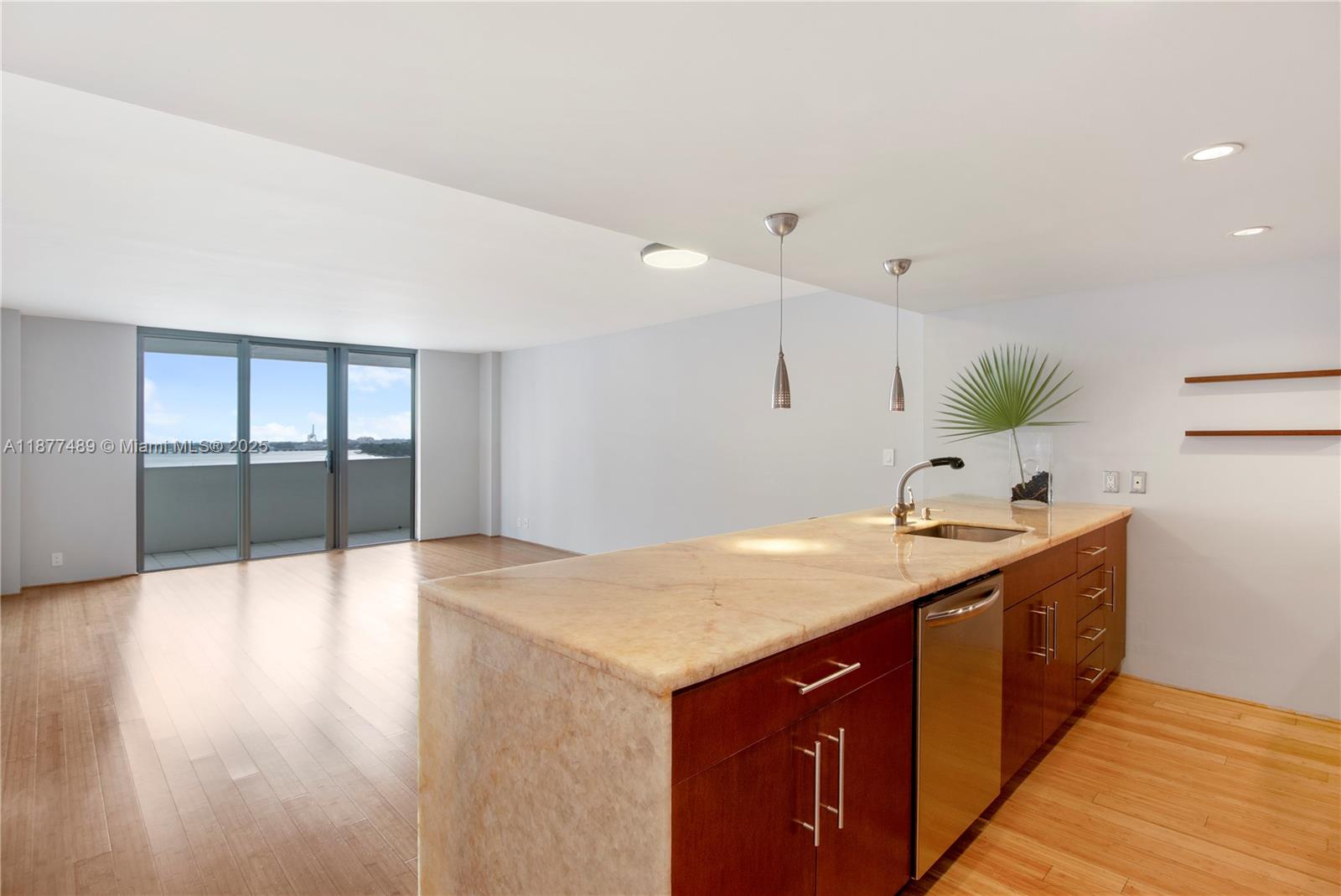 Wake up to direct Biscayne Bay views in this light-filled 1 bed / 1.5 bath Belle Isle beauty! Spend evenings watching the sunset & Miami skyline from your terrace. This rarely-available, 950 sq ft unit has a bedroom with en-suite bathroom & generous walk-in closet, updated open kitchen with large onyx countertop, and hurricane-impact sliding balcony doors. Island Terrace Condo, designed by Morris Lapidus and beautifully renovated, offers one of the best locations in Miami Beach. Situated opposite The Standard Hotel & Spa and a short stroll to Sunset Harbour, Lincoln Road, Trader Joe’s, Fresh Market, restaurants, marina, gyms, yoga, shopping and more! Amenities include pool overlooking the bay, fitness center, and 24/7 front desk staff & security. Rent includes cable, internet & water.