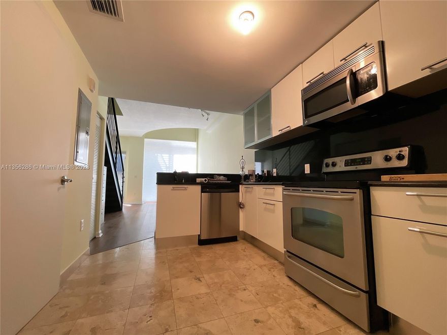 Enjoy the tranquility of living in this high-end, gated building with assigned parking, fitness center, sun deck, heated pool, and whirlpool. TWO-STORY Loft, 1 Bedroom 1.5 Bathrooms, full Laundry inside the Loft, within walking distance to markets, shops, nightlife, and many more. All in a spectacular condominium building by award-winning architect Reinaldo Borges In the heart of Coconut Grove