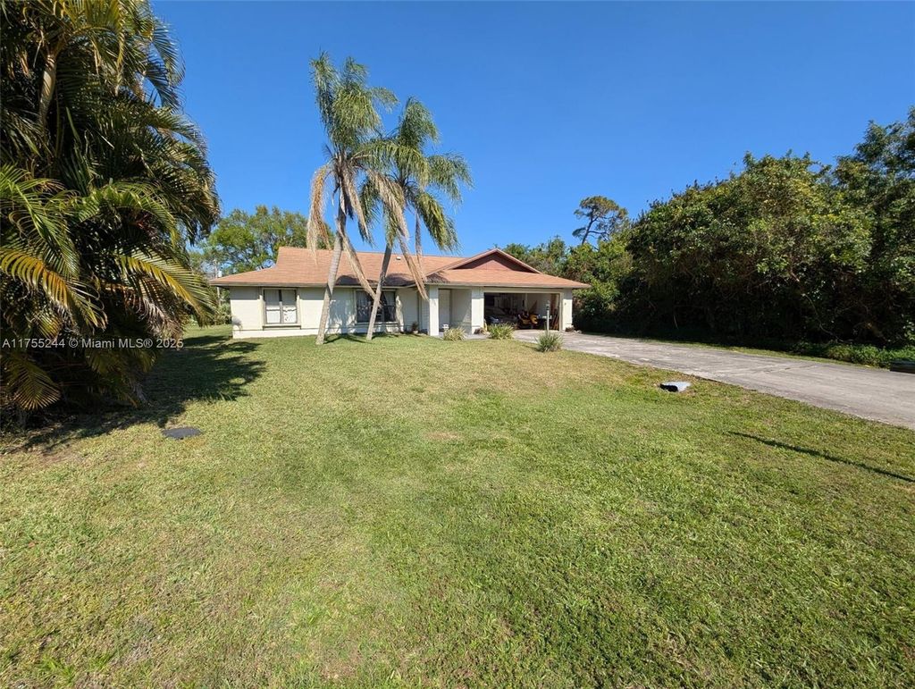 Photo of 2477 SE Renick Ave, Port Saint Lucie, FL 34952 (MLS # A11755244)