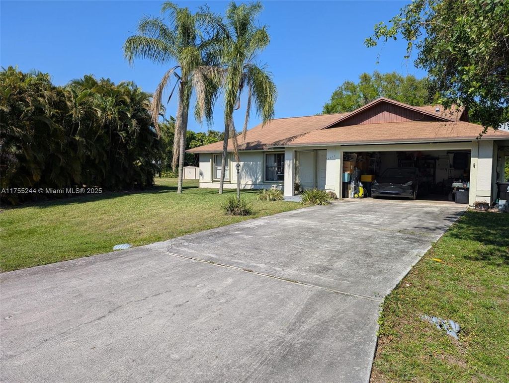 Photo of 2477 SE Renick Ave, Port Saint Lucie, FL 34952 (MLS # A11755244)