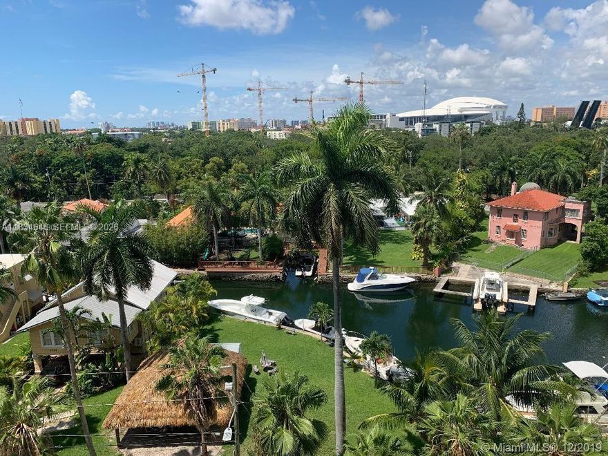 Discover this rare chance to own a spacious corner residence in the growing riverfront neighborhood of historic Spring Garden. This updated 2B/2B Condo offers 1,067 sq. ft. of comfortable living space with panoramic views from a large private balcony, accessible from the living room and the primary suite. Hurricane-impact windows, updated kitchen with granite countertops & stainless steel appliances. In-unit washer/dryer (2021) *New A/C Unit (2022) Microwave (2025) 2 assigned covered parking spaces, a true convenience. Rooftop gym, a community lounge with a kitchen. Located just steps from the Metrorail and minutes from UM Medical, Jackson Memorial, Brickell, Downtown & Miami International Airport. Great for investors and end-users looking for location, lifestyle, and long-term value.