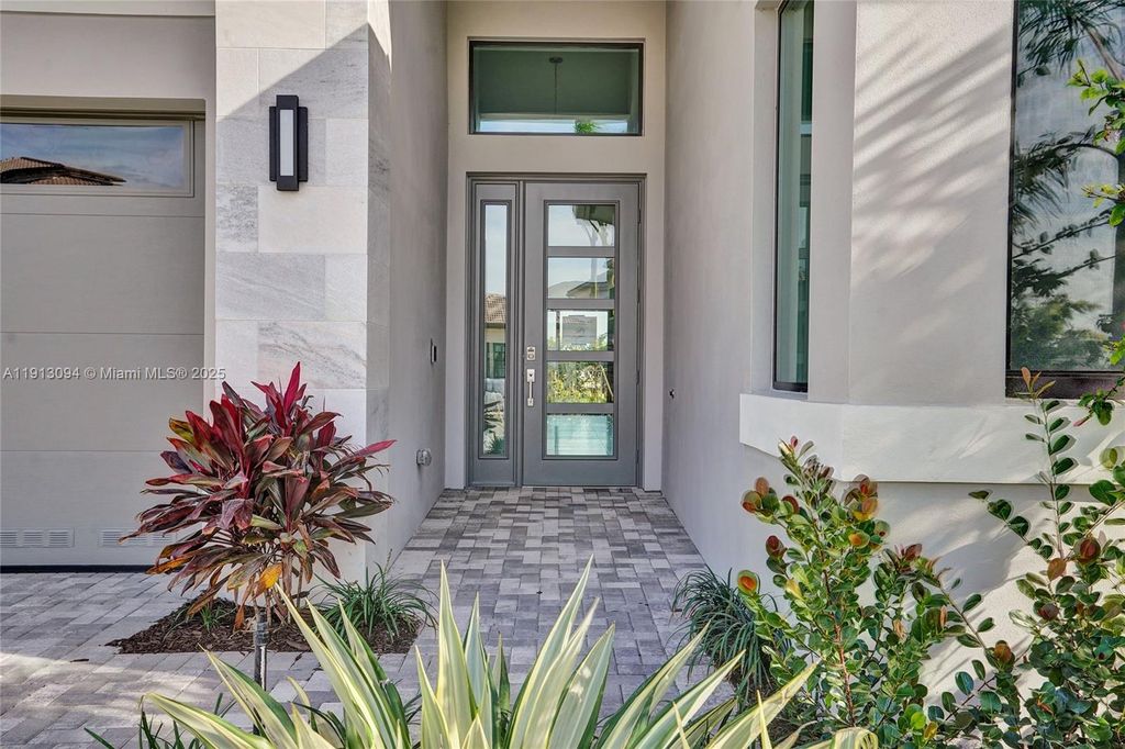 Photo of 9918 Rising Wing St, Palm Beach Gardens, FL 33412 (MLS # A11913094)