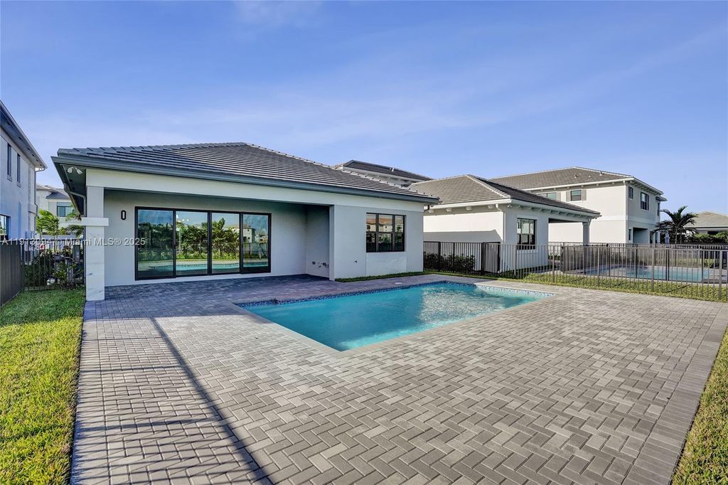 Photo of 9918 Rising Wing St, Palm Beach Gardens, FL 33412 (MLS # A11913094)