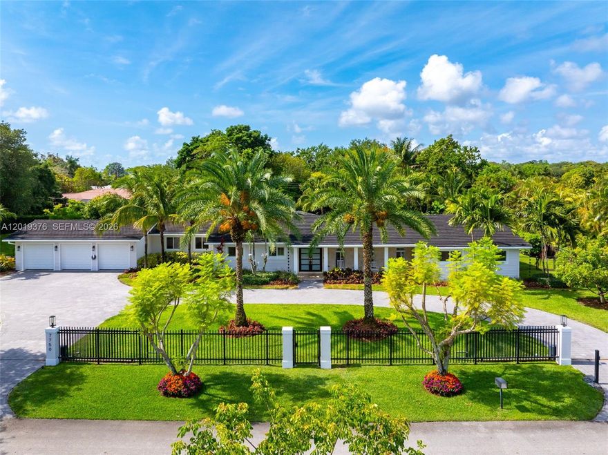 Stunning 6-bed/4.5-bath house in the heart of Pinecrest, completely rebuilt in 2019 on an expansive 38,027 sq. ft. lot. This exceptional home features a saltwater pool, a chef's outdoor kitchen, a custom playhouse, and mature fruit trees — all with extra room to add a tennis, soccer, or basketball court. 

Inside, the primary suite overlooks the pool and boasts a spacious walk-in closet and a spa-style bath with double sinks, a soaking tub, and shower. The kitchen features a large cooking island perfect for entertaining, Kitchen-Aid fridge and built-in ovens, microwave, and dishwasher. Enjoy freshly polished floors, custom built-in closets, motorized blackout shades, and a wet bar with ice machine and wine cooler, while the Aroma 360 whole-home HVAC diffuser adds a refined touch throughout. The air-conditioned garage gym is outfitted with a professional-grade Jacked Up all-in-one system including a functional trainer, full-length mirrors, and rubber flooring — plus a Tesla charger and second EV charging station. 

Powered by solar panels and four Tesla Powerwalls at ~$100/month, with updated plumbing, electrical, a 2019 roof, and a whole-home Ring and Abode security system. Living in Pinecrest offers an upscale lifestyle with lush, tree-lined streets, top-rated schools, and convenient access to Miami’s shopping, dining, cultural attractions, and outdoor recreation.