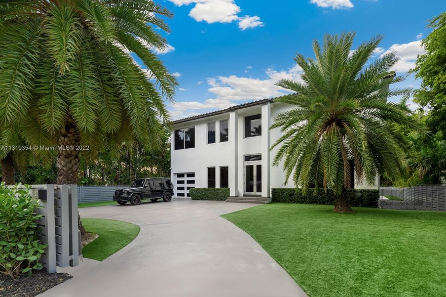 Step Inside With Me! This beautifully renovated modern home is located directly across from the ocean on an oversized nearly 12,000 sf lot. This 2-story property has incredible natural light, high ceilings, glass details, minimalist decor - all you would expect from a contemporary house. With East Facing exposure, it offers 5 bedrooms all with en-suite baths. Immediate awe in the grand foyer & living spaces along with a formal dining and spacious eat-in kitchen with views of the lovely pool setting. The backyard is an ideal place for entertaining with a built-in outdoor marble kitchen, sparkling blue pool and ample patio space. The exclusive Golden Beach offers private beach access, tennis, its own police, new amenity pavilion coming soon with gym, pickle ball, juice bar, & meeting rooms.