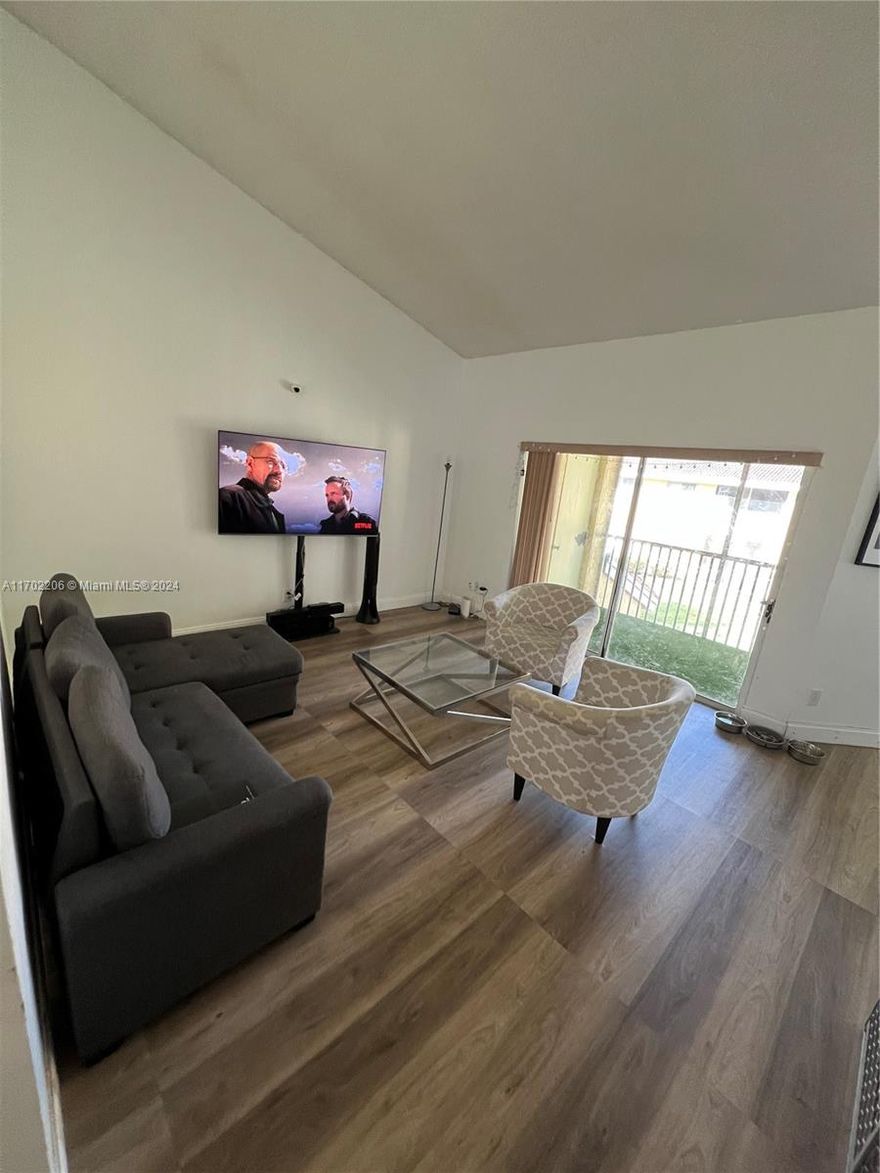 This updated 2-bedroom, 2-bathroom unit in Napoli Gardens offers a fantastic Coral Springs location! Features include a brand new water heater, 2018 AC (serviced Nov 2024), new flooring (Oct 2024), and brand new porcelain tile in the bathrooms (Sept 2024). The kitchen includes stainless steel appliances and a cozy nook. Enjoy spacious walk-in closets, and a turfed balcony. Additional updates include new baseboards, a finished vinyl staircase, fresh paint, updated windows, and new bathroom mirrors. In-unit washer/dryer included. No active assessments, and the Association has reserves.